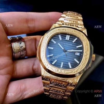 Patek Philippe Nautilus Replica Watches Yellow Gold Blue Dial